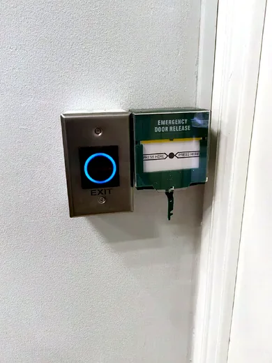Touch to open and emergency release